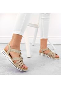 Komfortowe sandały damskie wsuwane z gumkami beżowe Rieker V0649-62 beżowy. Zapięcie: bez zapięcia. Kolor: beżowy #2