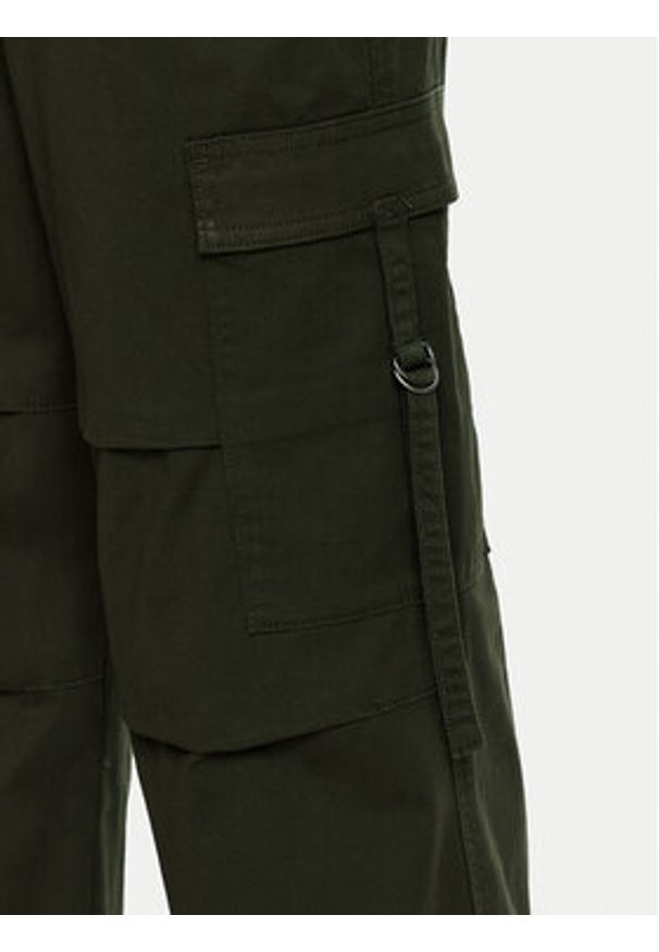 Champion Spodnie dresowe 117503 Zielony Oversize. Kolor: zielony. Materiał: bawełna