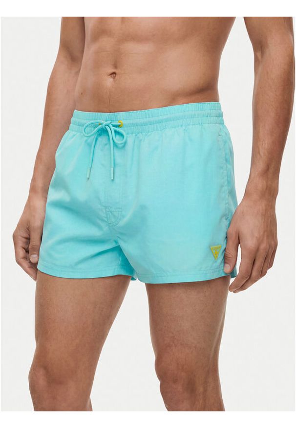 Guess Szorty kąpielowe F6GT25 WG282 SHORT Niebieski jasny Regular Fit. Kolor: niebieski. Materiał: syntetyk