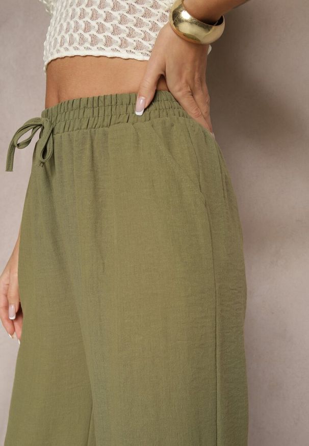 Renee - Ciemnozielone Spodnie o Szerokim Kroju High Waist Edilisea. Okazja: na co dzień, na spotkanie biznesowe, do pracy. Stan: podwyższony. Kolor: zielony. Styl: biznesowy, elegancki, casual
