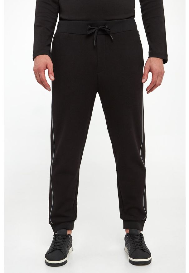 Spodnie dresowe męskie Tjanko JOOP!. Materiał: dresówka
