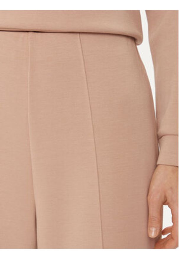 United Colors of Benetton - United Colors Of Benetton Spodnie dzianinowe 3UNN3F03B Beżowy Relaxed Fit. Kolor: beżowy. Materiał: wiskoza, syntetyk