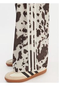 Adidas - adidas Spodnie dresowe Satin KA2668 Brązowy Wide Leg. Kolor: brązowy. Materiał: syntetyk #5