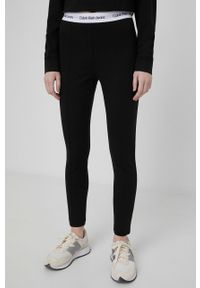 Calvin Klein Jeans legginsy damskie kolor czarny gładkie. Kolor: czarny. Materiał: materiał, włókno, dzianina, wiskoza. Wzór: gładki