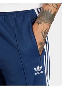 Adidas - adidas Spodnie dresowe adicolor Classics Beckenbauer IP0421 Niebieski Slim Fit. Kolor: niebieski. Materiał: syntetyk, bawełna #4
