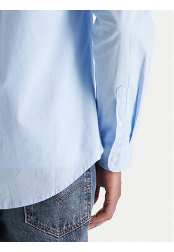 Tommy Jeans Koszula DM0DM22026 Błękitny Regular Fit. Kolor: niebieski. Materiał: bawełna