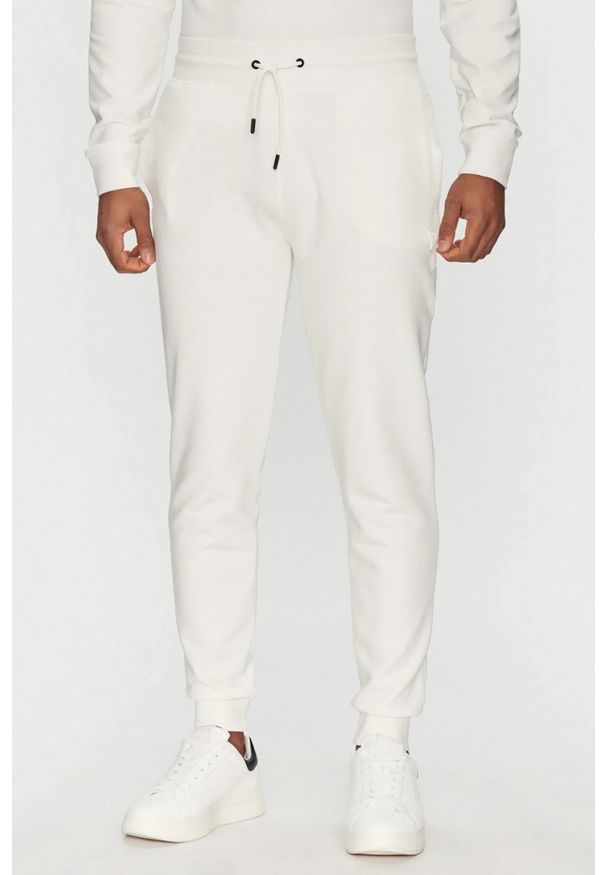 Guess - GUESS Białe spodnie męskie Aldwin, Rozmiar L. Kolor: biały. Materiał: poliester, bawełna, materiał