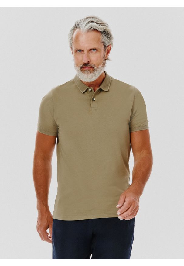 Pako Lorente - PAKO LORENTE – Gładki bawełniany t-shirt polo w kolorze zielonym. Okazja: na co dzień. Typ kołnierza: polo. Kolor: zielony. Materiał: bawełna. Wzór: gładki. Styl: casual