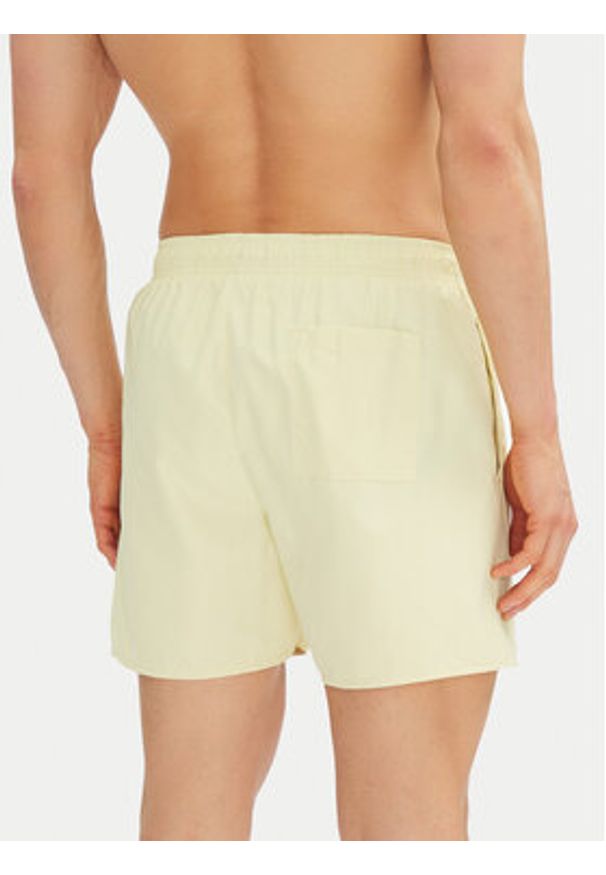 Calvin Klein Swimwear Szorty kąpielowe KM0KM01101 Żółty Regular Fit. Kolor: żółty. Materiał: syntetyk