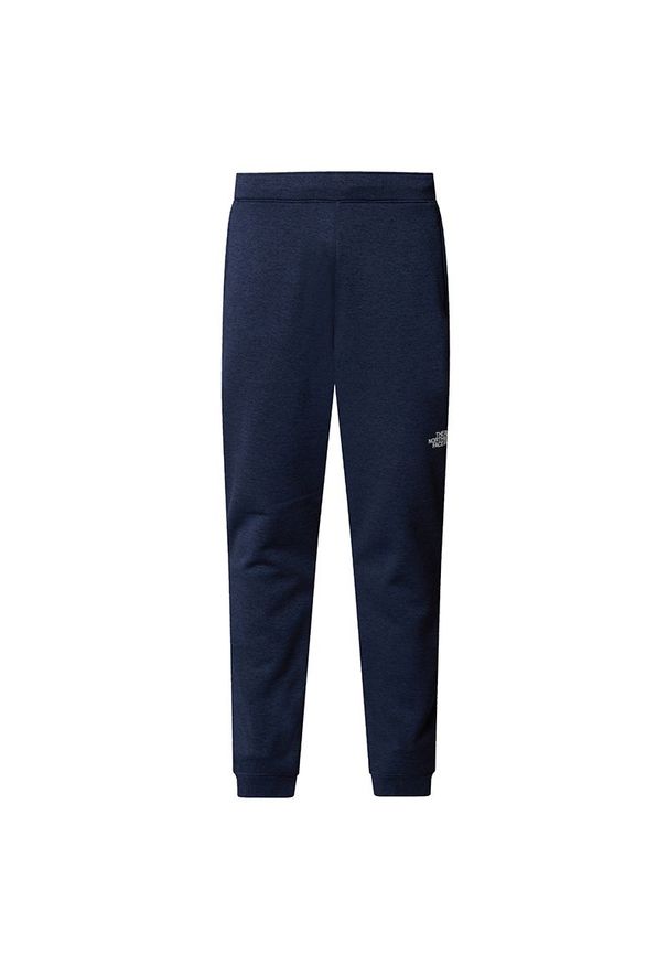 Spodnie męskie The North Face Joggers Reaxion 0A8CNQ8Q01 - granatowe. Kolor: niebieski. Materiał: dresówka, poliester, polar