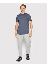 Ellesse Spodnie dresowe Granite SHK12643 Szary Regular Fit. Kolor: szary. Materiał: dresówka, bawełna