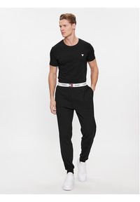 Tommy Jeans Spodnie dresowe UM0UM02962 Czarny Regular Fit. Kolor: czarny. Materiał: bawełna #5