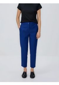 Reserved - Spodnie w kant z bawełną - niebieski. Kolor: niebieski. Materiał: bawełna