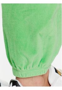 Champion Spodnie dresowe 116257 Zielony Regular Fit. Kolor: zielony. Materiał: bawełna, dresówka