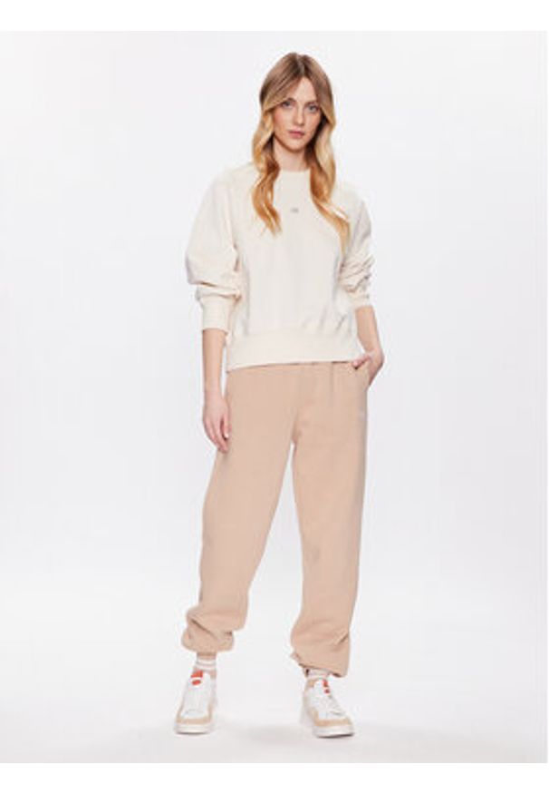 New Balance Bluza WT31500 Écru Oversize. Materiał: bawełna