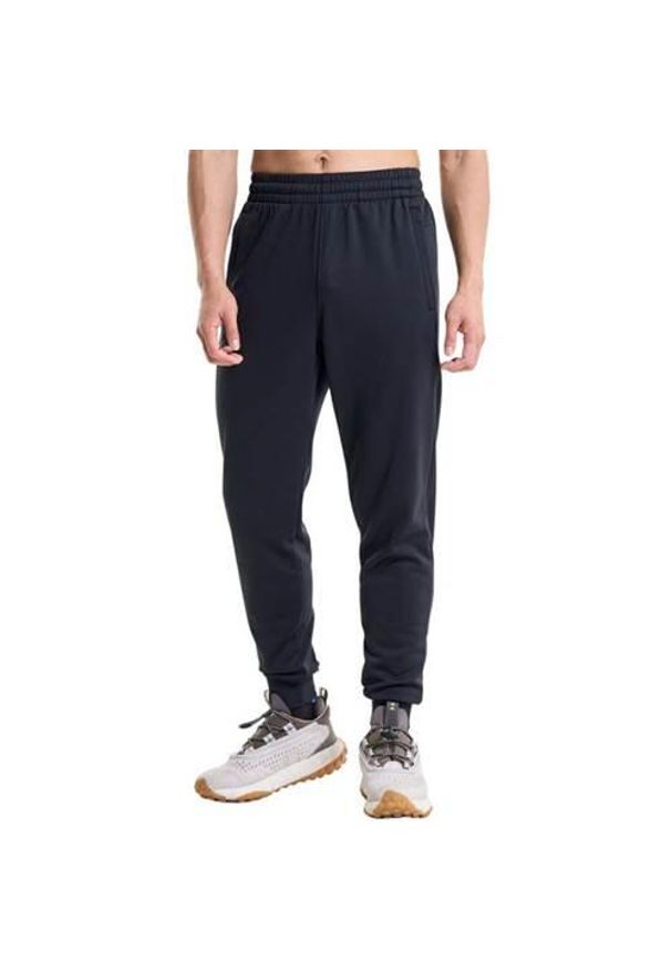 Spodnie treningowe męskie Under Armour Fleece Joggers Loose. Kolor: czarny, biały, wielokolorowy. Materiał: bawełna. Sport: turystyka piesza