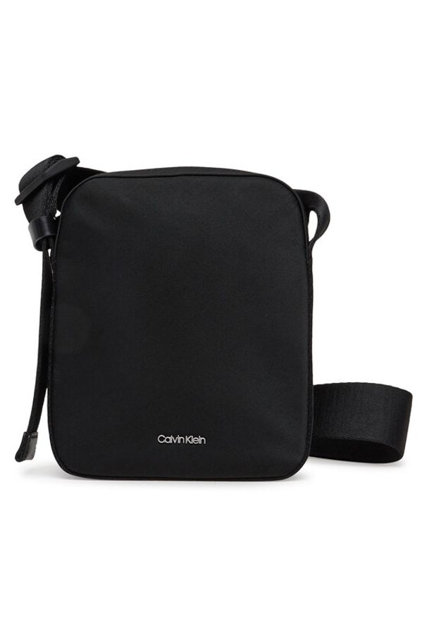 Calvin Klein Saszetka Ck Ease Reporter S K50K512886 Czarny. Kolor: czarny. Materiał: materiał