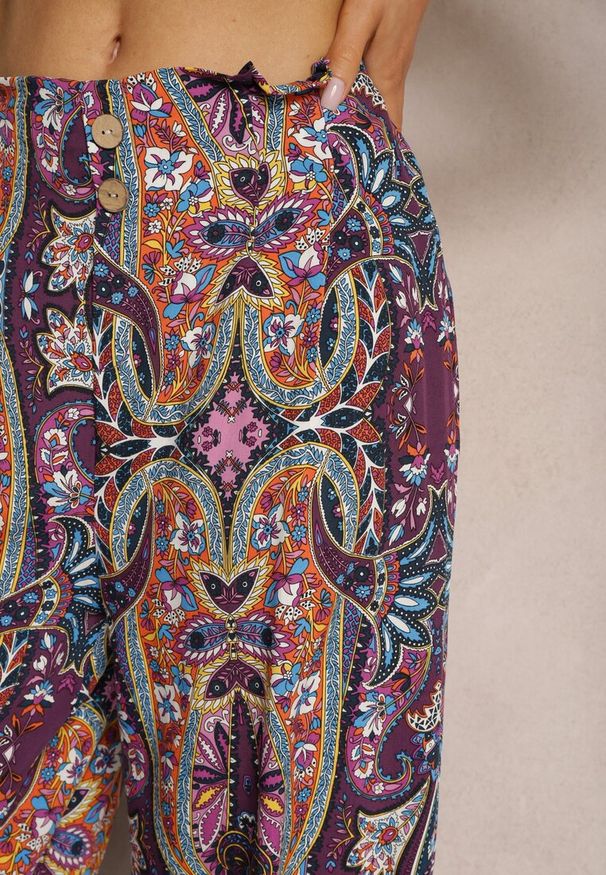 Renee - Fioletowe Wiskozowe Spodnie High Waist o Szerokim Kroju z Gumką w Talii Vimashia. Okazja: na co dzień, na spotkanie biznesowe, do pracy. Stan: podwyższony. Kolor: fioletowy. Materiał: wiskoza. Styl: biznesowy, casual