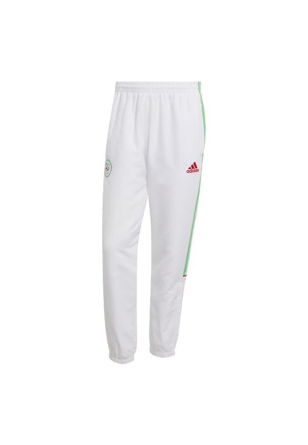 Adidas - Spodnie dresowe Algeria UBP. Kolor: biały. Materiał: dresówka. Sezon: lato. Sport: piłka nożna