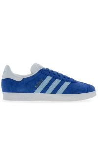 Adidas - Buty męskie adidas Gazelle HQ9185 - niebieskie. Okazja: na uczelnię. Zapięcie: pasek. Kolor: niebieski. Materiał: zamsz, skóra, guma. Szerokość cholewki: normalna. Wzór: paski, aplikacja. Sezon: lato. Model: Adidas Gazelle #1