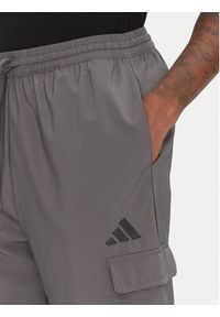 Adidas - adidas Spodnie dresowe Essentials Small Logo JD1822 Szary Regular Fit. Kolor: szary. Materiał: syntetyk