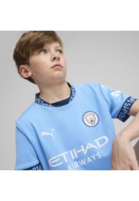 Koszulka piłkarska dla dzieci Puma Manchester City domowa sezon 24/25. Materiał: materiał. Sport: piłka nożna