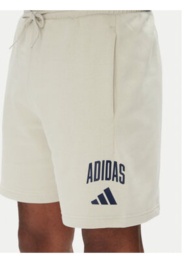 Adidas - adidas Szorty sportowe Collegiate JM1726 Beżowy Regular Fit. Kolor: beżowy. Materiał: syntetyk, bawełna. Styl: sportowy
