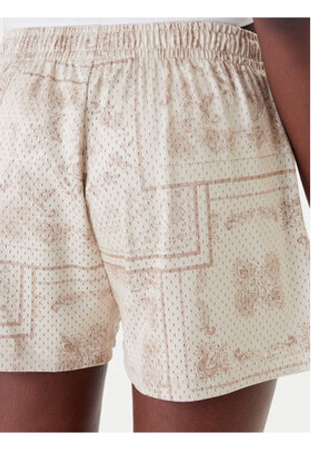 Karl Kani Szorty sportowe Signature Mesh Mini PD00005437 Beżowy Regular Fit. Kolor: beżowy. Materiał: syntetyk