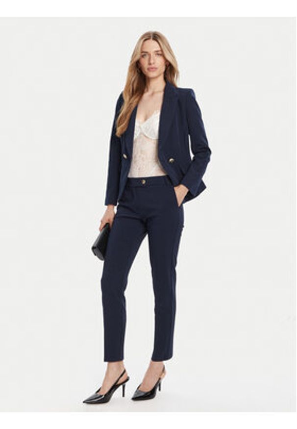 Rinascimento Chinosy CFC0126225003 Granatowy Slim Fit. Kolor: niebieski. Materiał: syntetyk