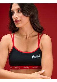 Sinsay - Biustonosz sportowy Coca Cola - czarny. Kolor: czarny