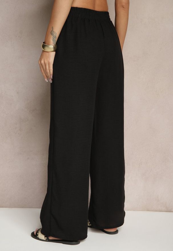 Renee - Czarne Spodnie o Szerokim Kroju High Waist Edilisea. Okazja: na co dzień, na spotkanie biznesowe, do pracy. Stan: podwyższony. Kolor: czarny. Styl: biznesowy, elegancki, casual