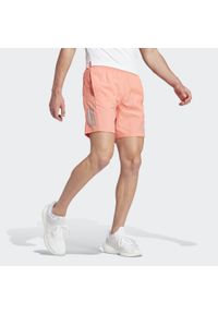 Adidas - Own the Run Shorts. Kolor: pomarańczowy, wielokolorowy, szary. Materiał: materiał. Sport: bieganie