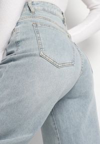 Born2be - Jasnoniebieskie Jeansy o Szerokim Kroju z Wysokim Stanem Sesadela. Okazja: na co dzień. Stan: podwyższony. Kolor: niebieski. Styl: casual, elegancki #7