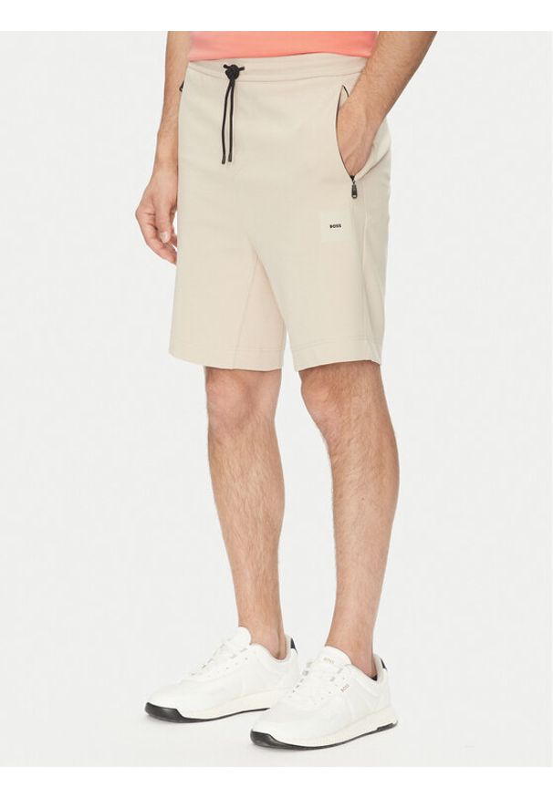 BOSS Szorty sportowe Headlo 50537199 Beżowy Regular Fit. Kolor: beżowy. Materiał: bawełna. Styl: sportowy