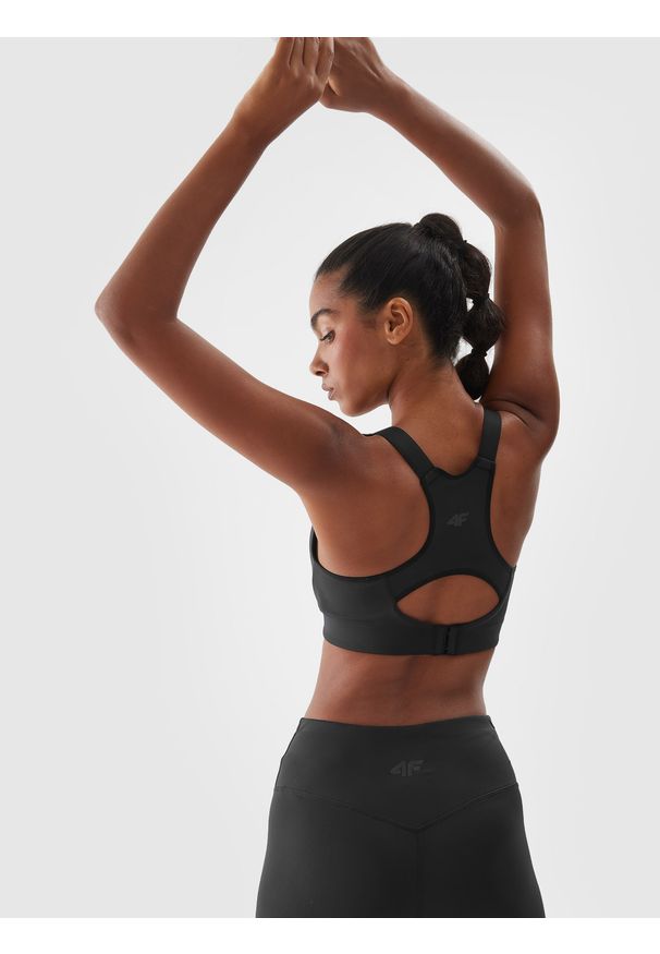 4f - 4F Biustonosz treningowy z wysokim wsparciem - czarny M. Kolor: czarny. Materiał: dzianina, elastan, włókno, syntetyk, materiał. Wzór: gładki, jednolity, ze splotem. Sport: fitness, bieganie