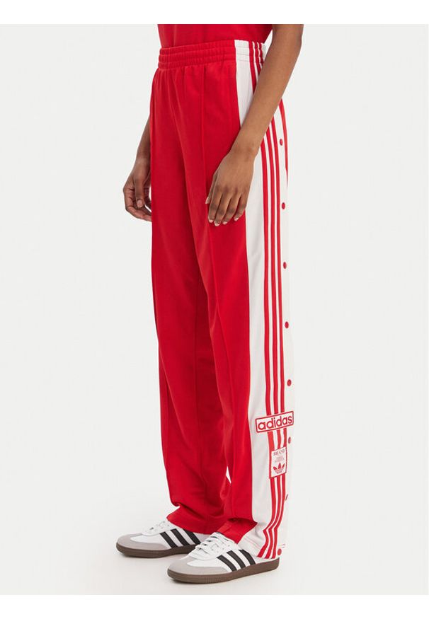 Adidas - adidas Spodnie dresowe Adibreak KD6324 Czerwony Loose Fit. Kolor: czerwony. Materiał: syntetyk