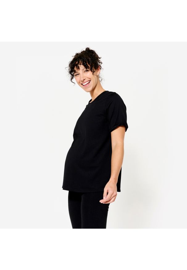 DOMYOS - Koszulka do jogi damska Kimjaly ciążowa. Kolekcja: moda ciążowa. Kolor: czarny. Materiał: materiał, elastan, skóra. Sport: joga i pilates