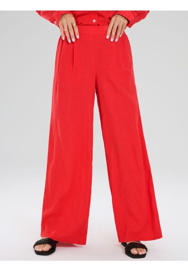 Sinsay - Spodnie wide leg - czerwony. Kolor: czerwony