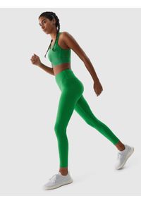 4f - Legginsy do biegania szybkoschnące damskie - zielone. Stan: podwyższony. Kolor: zielony. Materiał: syntetyk, elastan, materiał, włókno, dzianina. Długość: do kostek. Wzór: ze splotem, jednolity, gładki. Sport: fitness, bieganie
