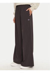 Champion Spodnie dresowe 117472 Czarny Wide Leg. Kolor: czarny. Materiał: syntetyk