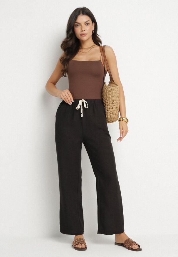 Born2be - Czarne Spodnie o Szerokim Kroju z Gumką i Wiązaniem w Talii Mirastra. Okazja: na spacer, na co dzień. Kolor: czarny. Styl: elegancki, casual, klasyczny, sportowy