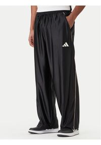 Adidas - adidas Spodnie dresowe Stadium Shiny JZ6848 Czarny Loose Fit. Kolor: czarny. Materiał: syntetyk #1