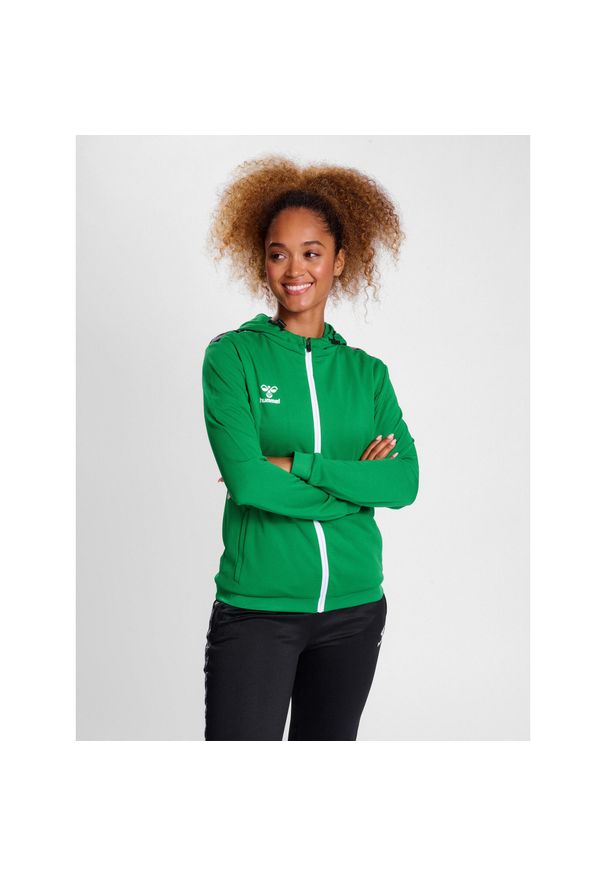 Damska poliestrowa bluza dresowa zapinana na zamek z kapturem Hummel Authentic. Typ kołnierza: kaptur. Kolor: zielony. Materiał: poliester, dresówka. Sport: fitness