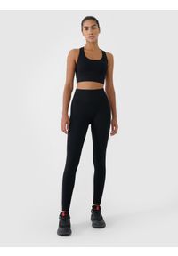 4f - 4F Legginsy treningowe bezszwowe damskie - czarne XS/S. Stan: podwyższony. Kolor: czarny. Materiał: dzianina, włókno, syntetyk, materiał, prążkowany, elastan. Wzór: gładki, ze splotem, jednolity. Sport: fitness