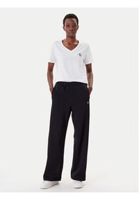 Calvin Klein Jeans Spodnie dresowe LV047C249G Czarny Regular Fit. Kolor: czarny. Materiał: bawełna #3