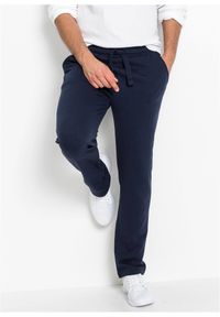 bonprix - Spodnie sportowe z miękką warstwą spodnią i równym dołem. Okazja: na co dzień. Kolor: niebieski. Materiał: dzianina, dresówka. Styl: sportowy #1
