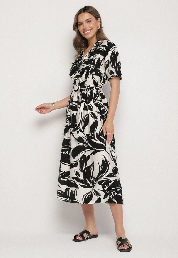 Born2be - Czarna Wiskozowa Sukienka o Koszulowym Kroju z Wiązanym Paskiem Uloanna. Okazja: na co dzień. Kolor: czarny. Materiał: wiskoza. Długość rękawa: krótki rękaw. Wzór: aplikacja. Typ sukienki: koszulowe. Styl: klasyczny, casual, elegancki