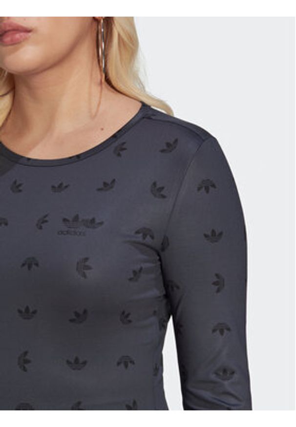 Adidas - adidas Bluzka Allover Print HL9137 Czarny Slim Fit. Kolor: czarny. Materiał: syntetyk. Wzór: nadruk