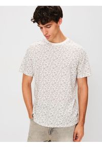 Sinsay - Bawełniana koszulka Minions - kremowy. Kolor: kremowy. Materiał: bawełna #1