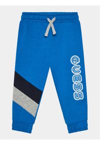 Guess Spodnie dresowe N4RQ11 KA6R4 Niebieski Regular Fit. Kolor: niebieski. Materiał: bawełna